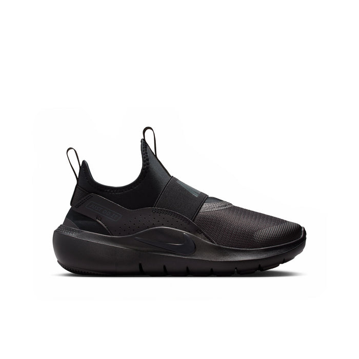 Youth black slip-on running sneaker with black strap and textured upper