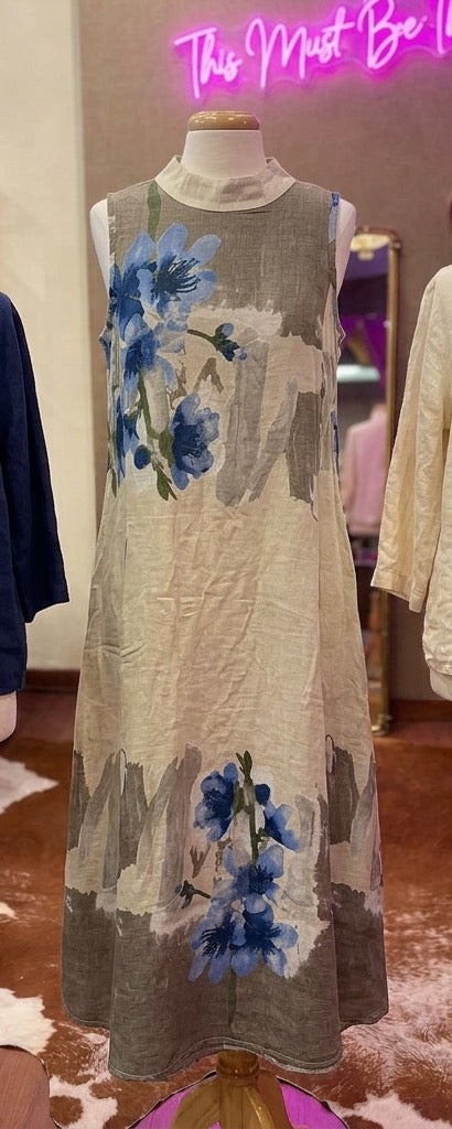 Camille & Co. flowered linen dress with a fitted bodice and flowing skirt, perfect for casual or summer wear.