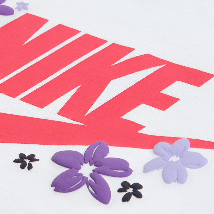 White T-shirt with red Nike graphic and purple flower patch details