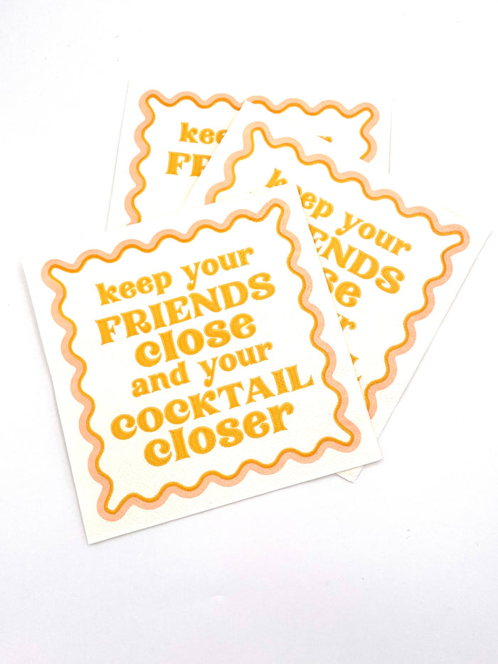 Set of 20 funny cocktail napkins by soiree-sisters featuring humorous "Keep Your Friends Close" design for parties and gatherings.