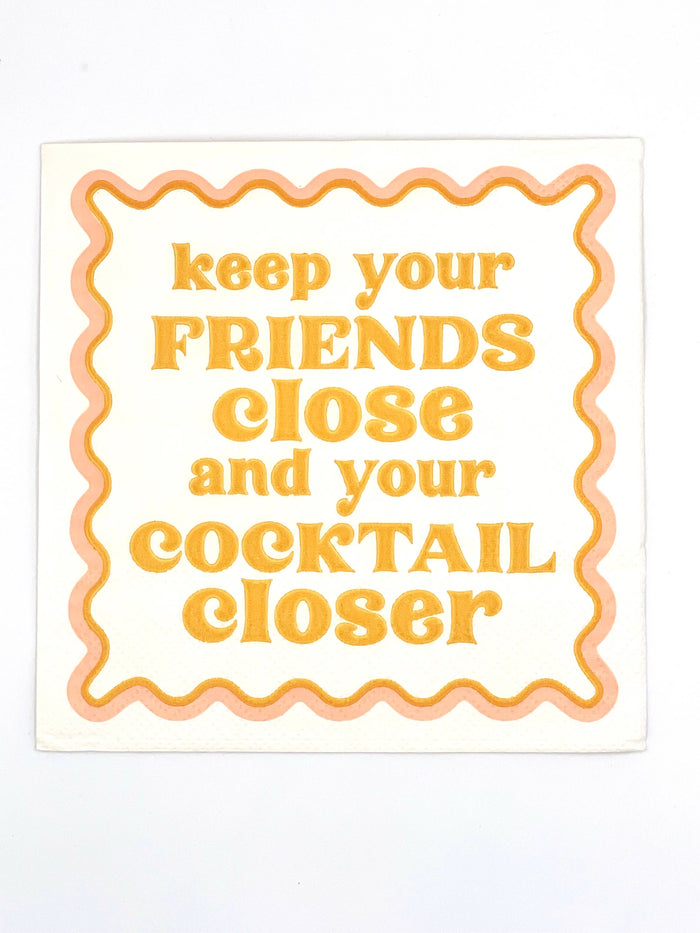 Set of 20 funny cocktail napkins by Soiree Sisters featuring humorous "Keep Your Friends Close" design for parties and gatherings.