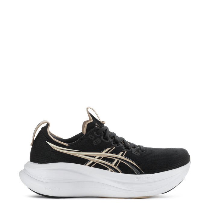 Women’s black running shoe with gold stripe details and white cushioned sole