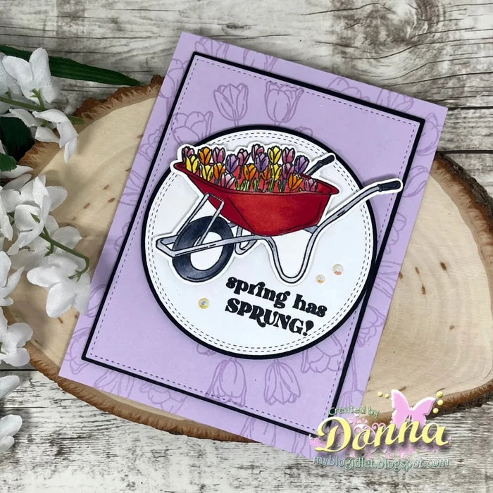 Gina K. Designs - Stamp &amp; Die Set - Spring Garden. Spring Garden is a stamp &amp; die set by Hannah Drapinski. This set is made of premium clear photopolymer and measures 6" X 8". Available at Embellish Away located in Bowmanville Ontario Canada. Example by Donna