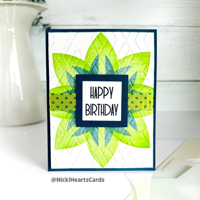 Gina K. Designs - Tool - Pointed Oval Stencil Builder. Gina K. Designs Art Screens can be used with ink, sprays, pastes, and gels to create beautiful backgrounds and images. Available at Embellish Away located in Bowmanville Ontario Canada. Example by Nicki at Hearts Cards.
