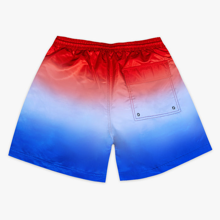 Back flat lay of BL101 red to blue ombre swim trunks with a red waistband and cargo pocket detail.