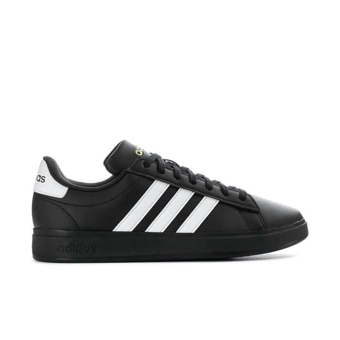 Men's black low-top sneakers with white triple stripes and lace-up design