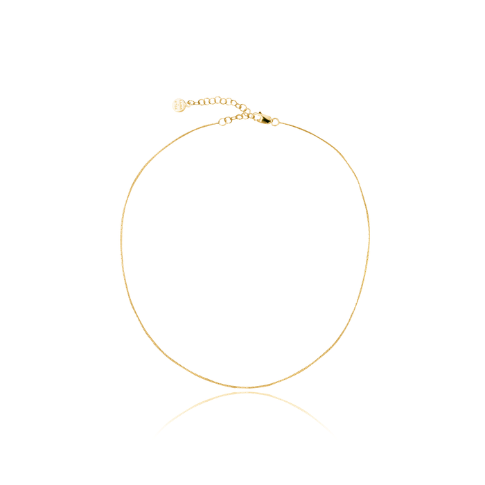 A delicate gold necklace with multiple adjustable loops, displayed on a white background.