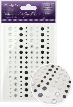This stunning selection of brand new gemstones from Hunkydory Crafts is the perfect essential addition to your craft stash! The brand new packs include 3 different sizes – 3mm, 5mm and 7mm and include a range of colours. Available at Embellish Away located in Bowmanville Ontario Canada. Crystal & Black