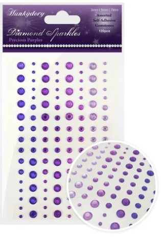 This stunning selection of brand new gemstones from Hunkydory Crafts is the perfect essential addition to your craft stash! The brand new packs include 3 different sizes – 3mm, 5mm and 7mm and include a range of colours. Available at Embellish Away located in Bowmanville Ontario Canada. Precious Purples