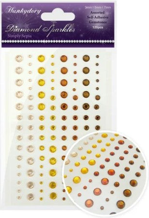 This stunning selection of brand new gemstones from Hunkydory Crafts is the perfect essential addition to your craft stash! The brand new packs include 3 different sizes – 3mm, 5mm and 7mm and include a range of colours. Available at Embellish Away located in Bowmanville Ontario Canada. Simply Sepia