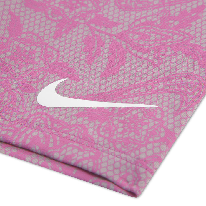 Kids patterned bike shorts in light magenta with white Nike swoosh