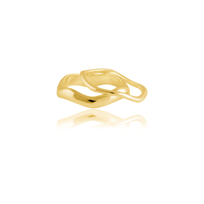 A gold ring with a fluid, intertwined design on a white background.
