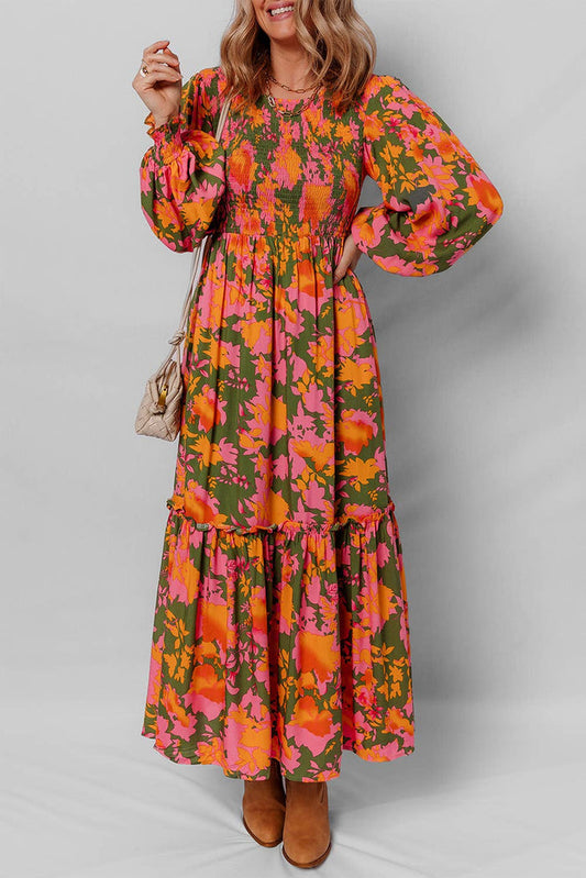 Little Daisy Closet floral smocked puff sleeve ruffled long dress with a flowy skirt and intricate floral pattern.
