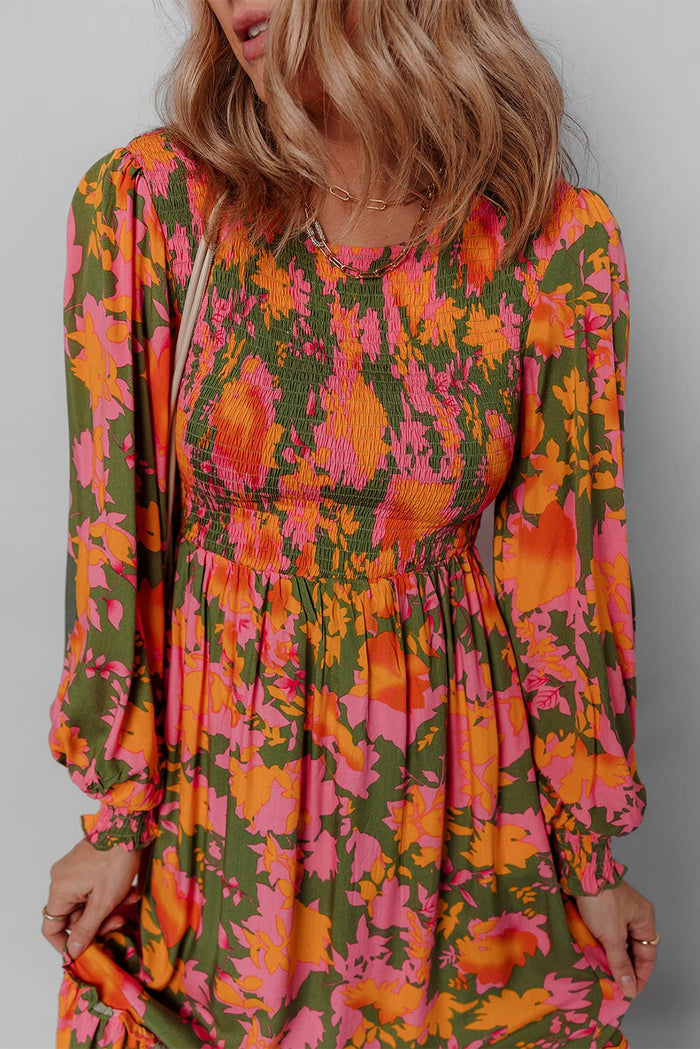 Little Daisy Closet floral smocked puff sleeve ruffled long dress with a flowy silhouette and floral pattern.