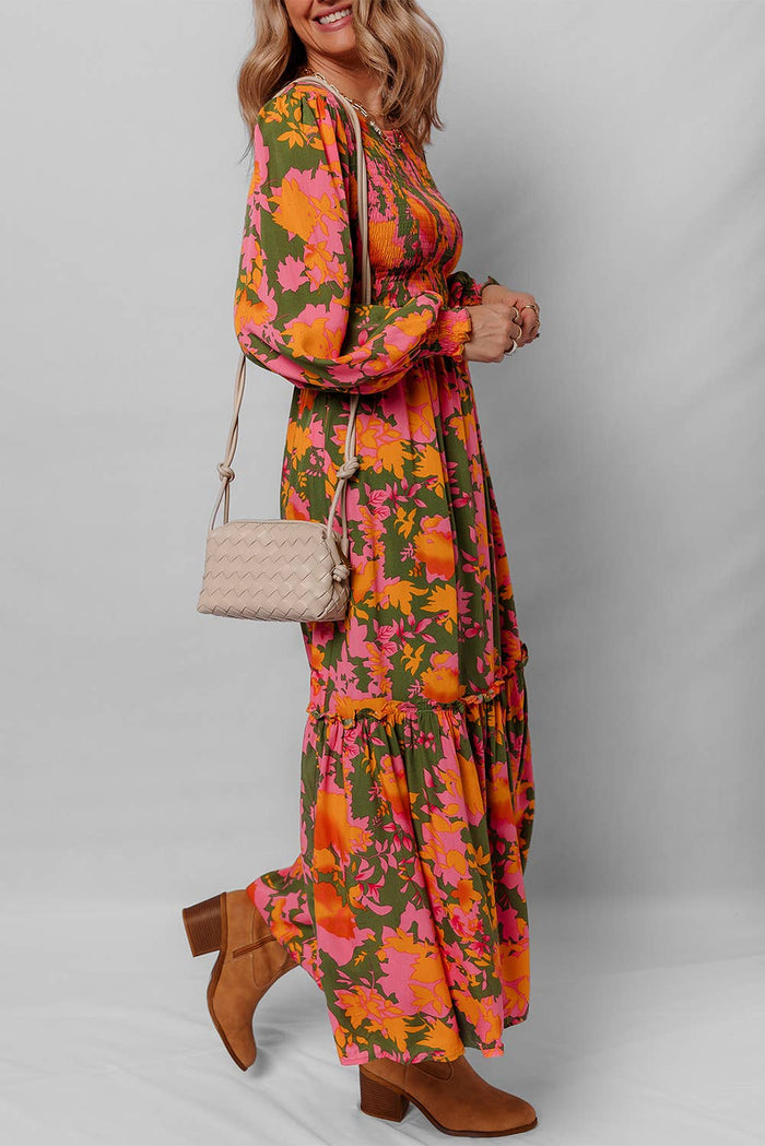 Little Daisy Closet floral smocked puff sleeve ruffled long dress with a flowing silhouette and intricate floral pattern.