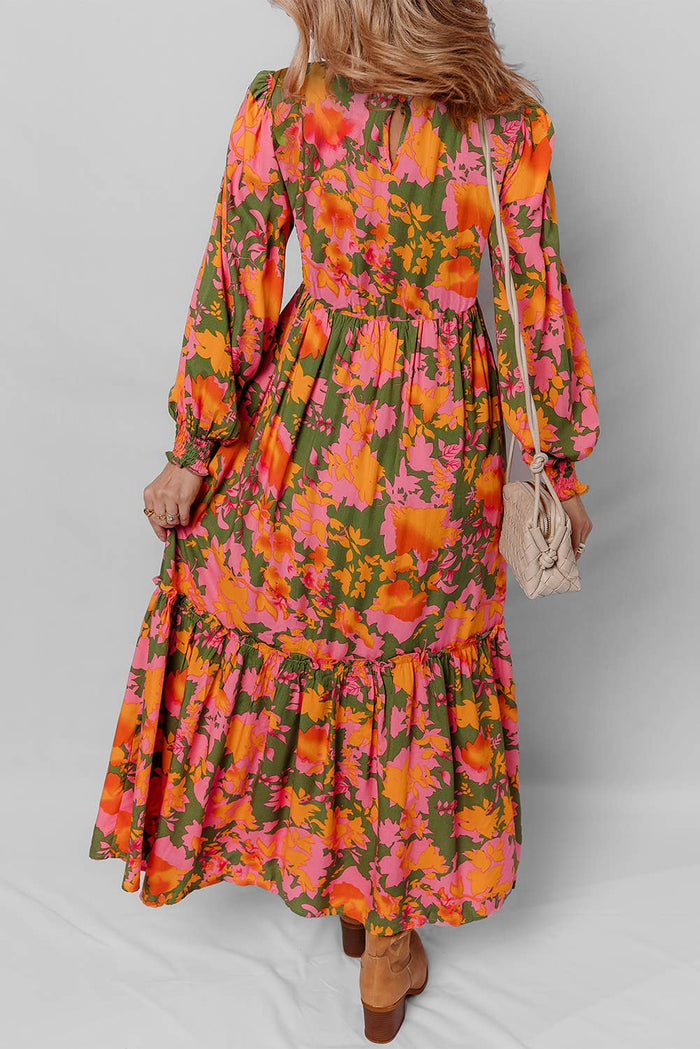 Little Daisy Closet floral smocked puff sleeve ruffled long dress displayed on a model, featuring a flowy design and delicate floral patterns.