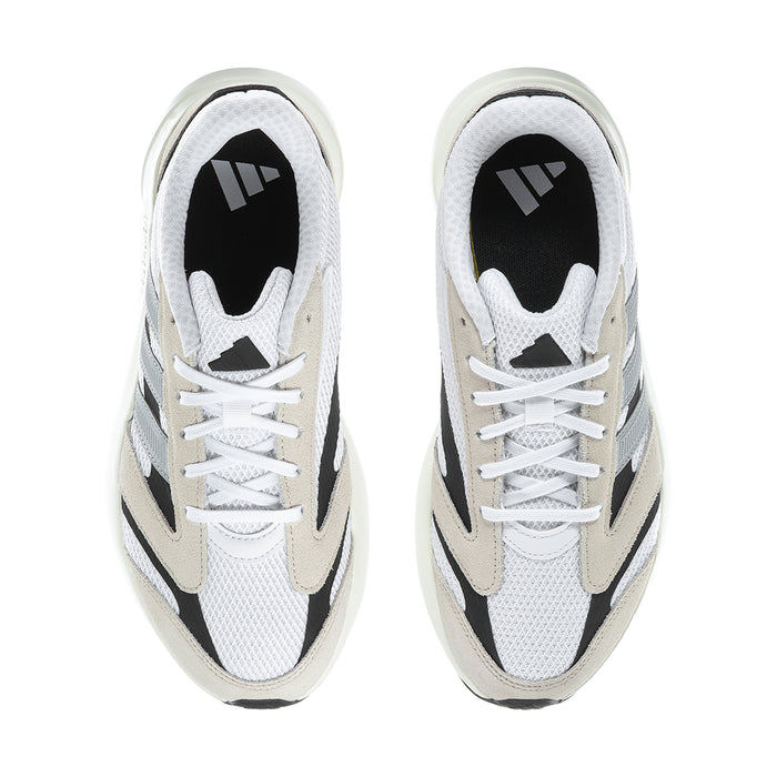 Pair of women's sneakers showing white mesh uppers, beige heel panels, black accents