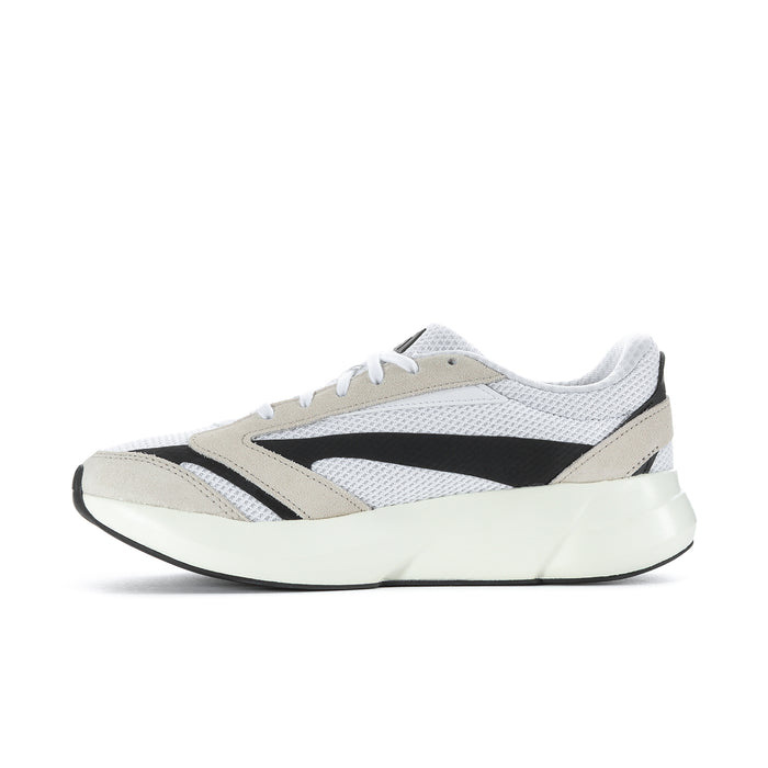 Women's lace-up low-top sneaker with black stripe overlay and light beige toe panel