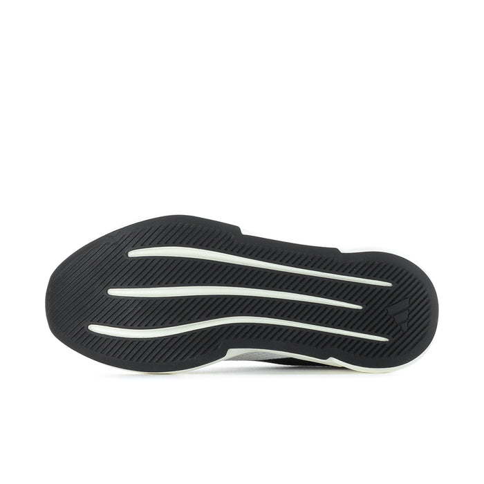 Women's sneaker outsole with black tread and light stripe lines on the rubber sole