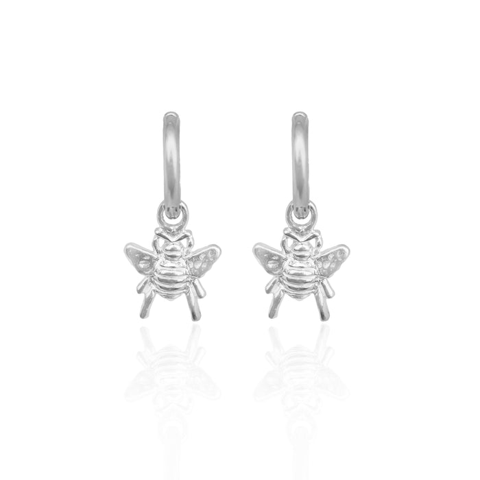 Silver bee-shaped earrings on a white background