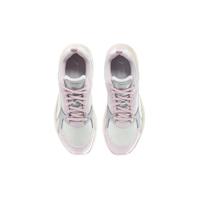 Youth sneakers in cream and pastel pink, shown from above with lace-up closure