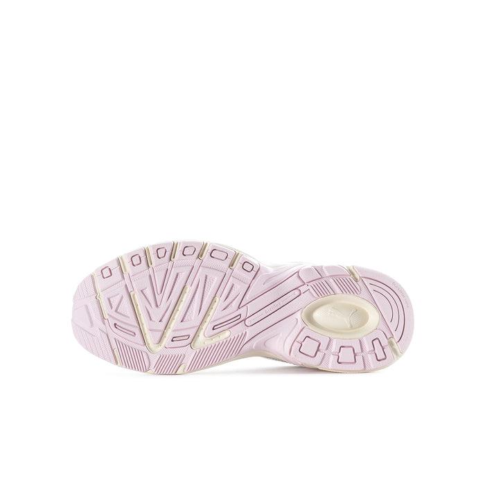 Youth sneakers outsole view in pastel pink/cream with traction tread pattern