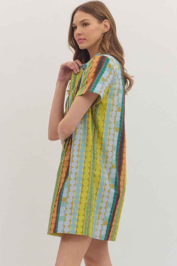 Entro Mod Dots Dress shown from the side, featuring a stylish polka dot pattern and comfortable fit.