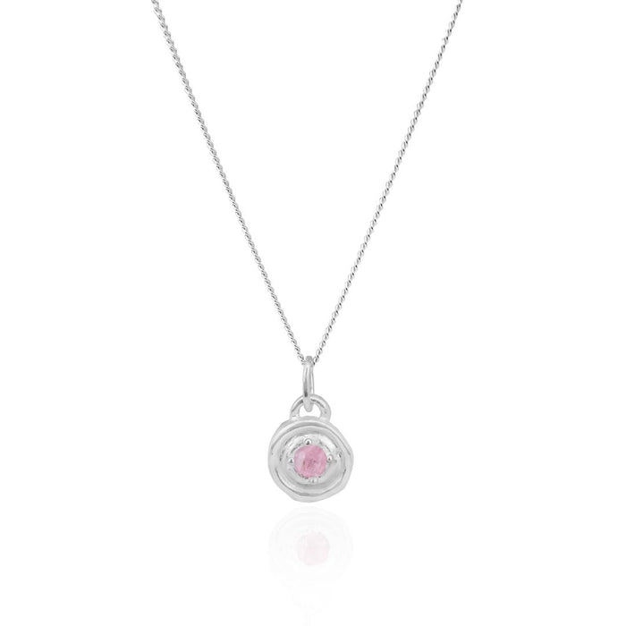 Silver necklace with a pink gemstone pendant on a white background