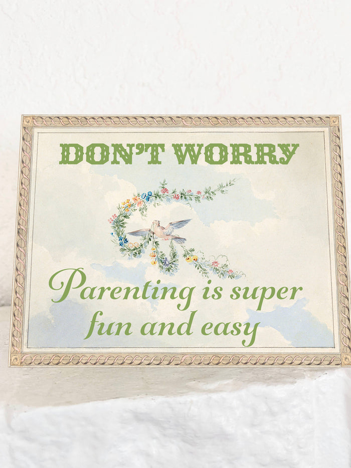 Set of "Parenting is Easy and Fun" cards by The Coin Laundry, featuring colorful illustrations and parenting tips.
