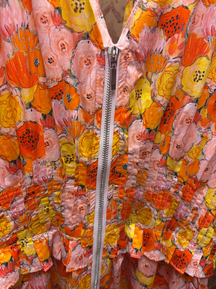 Entro Poppies Dress featuring a floral pattern, sleeveless design, and lightweight fabric ideal for summer wear.