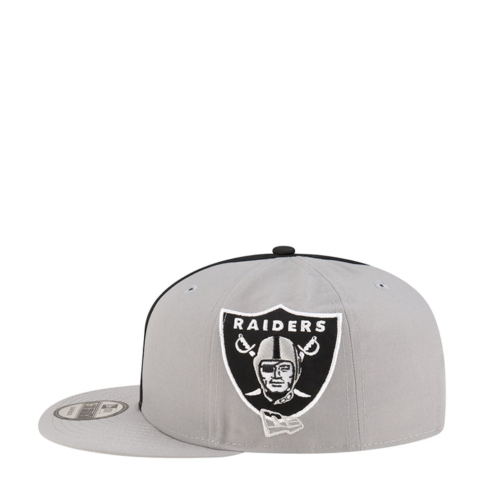 Light grey snapback cap with Raiders shield patch centered