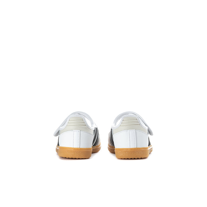 Kids white sneaker back view with heel tab and gum rubber sole
