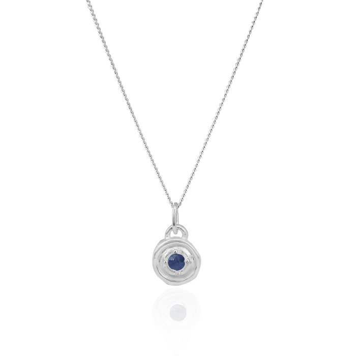 Silver necklace with a blue gemstone pendant on a white background