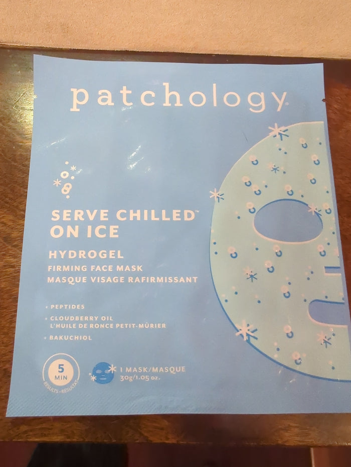 Patchology Serve Chilled On Ice Firming Hydrogel Facial Mask, single, showing the cooling hydrogel mask on a model's face.