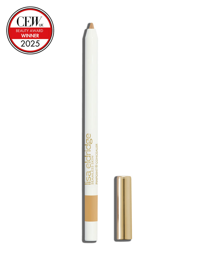 Pinpoint Concealer pencil in full with gold cap on a white background, featuring a CEW Beauty Award 2025 badge.