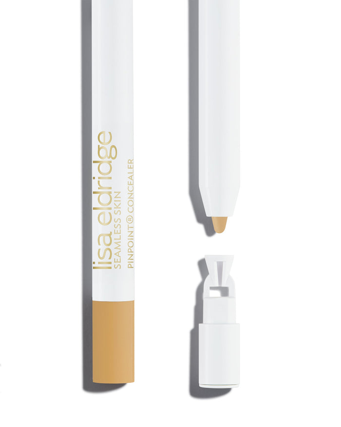 Lisa Eldridge Pinpoint® Concealer with applicator tip and sharpener end on a white background