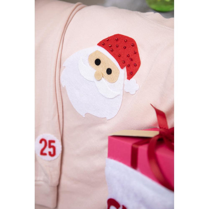 Sizzix - Bigz Die By Olivia Rose - Santa Claus. Complete with a pom pom hat and lovely rosy cheeks! Add to cards and papercraft makes like gift tags and wrap or cut from felt and fabric and embellish cushions, personalized pajamas and so much more! Available at Embellish Away located in Bowmanville Ontario Canada. Example by brand ambassador.