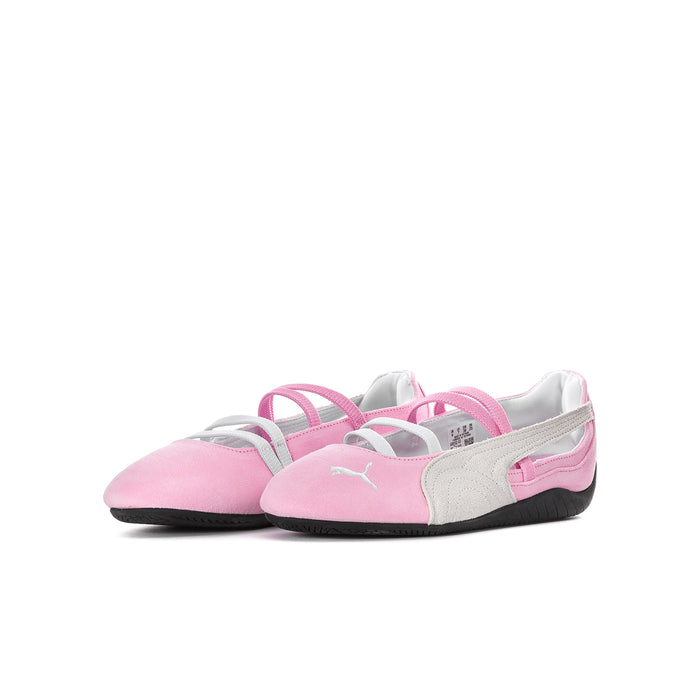 Youth ballet sneakers, pink upper with white overlays and Puma logo; black sole