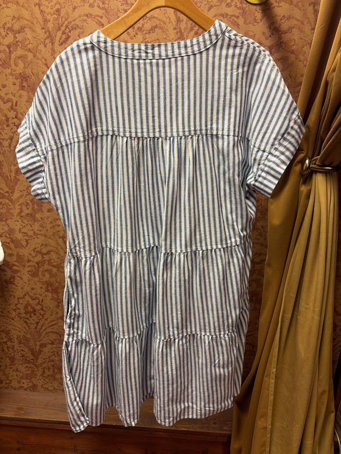 Camille & Co. striped ticking dress featuring a sleeveless design with vertical navy and white stripes, casual and stylish.