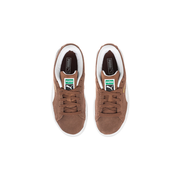 Kids brown suede sneakers with white trim, view of tongue label and laces