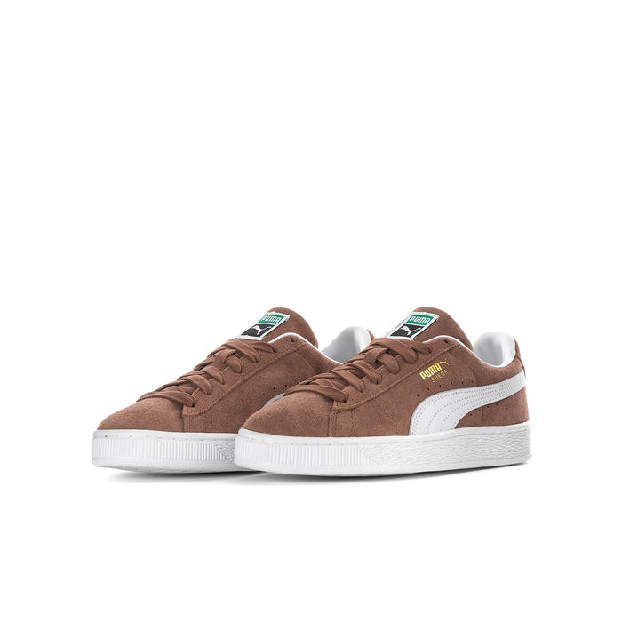 Youth suede sneakers, side view, brown uppers with white stripe and laces