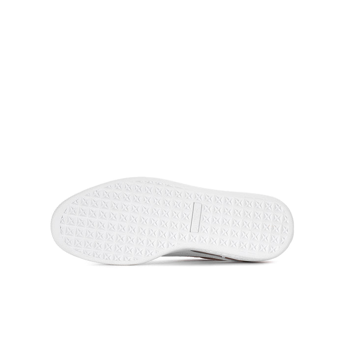 Youth suede sneakers, outsole view, textured white rubber sole