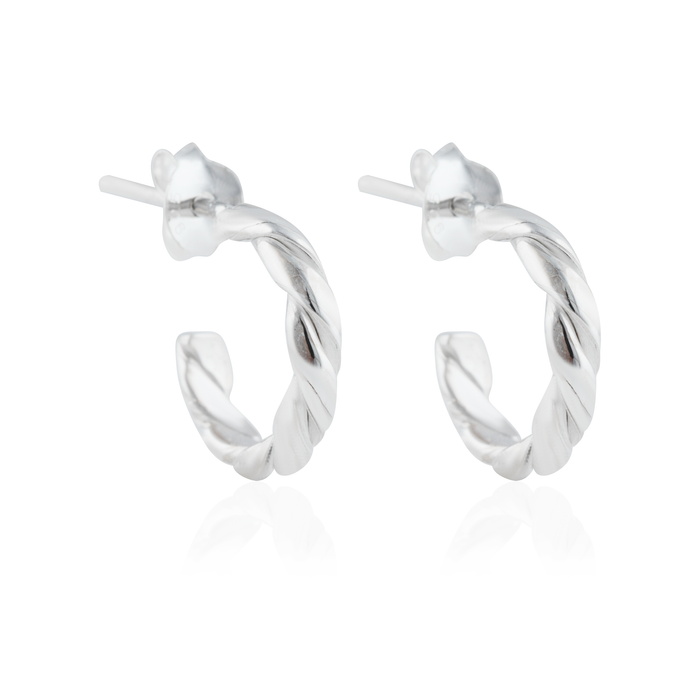 The Hudson twisted hoops earrings silver on white background
