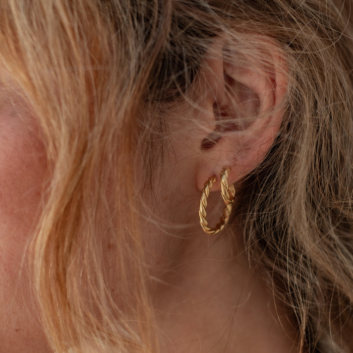 The Hudson Twisted Hoops  - Gold on woman with blonde hair