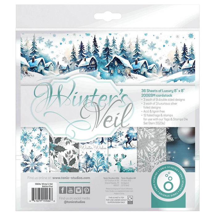Tonic Studios - Art Pad 8"X8" - Winter's Veil. This winter wonderland blue, silvery grey and white creates a serene holiday background. Includes 36 luxury sheets (3 of each double sided); acid and linen free. Available at Embellish Away located in Bowmanville Ontario Canada.