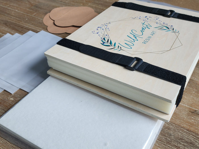 traditional flower press with paper and materials
