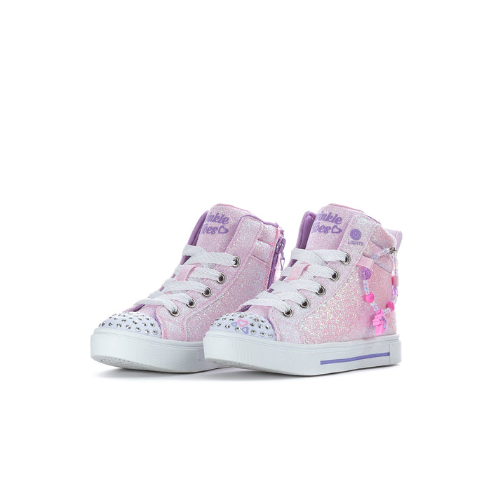 Kids pink glitter sneakers pair with lace-up front and side charm accents