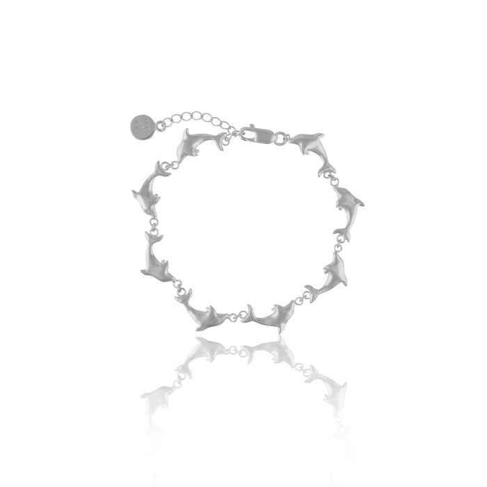 Handmade Luna & Rose x Tahnee Kelland ‘Vibes Don’t Lie’ silver bracelet, dolphin design symbolising flow, crafted sustainably in Bali.