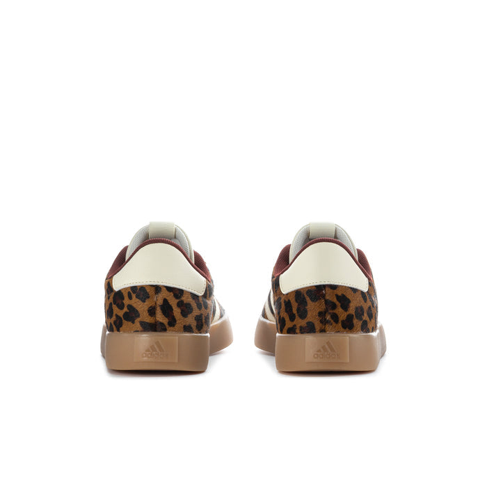 Leopard print sneakers with cream heel tab and brown gum heel sole detail