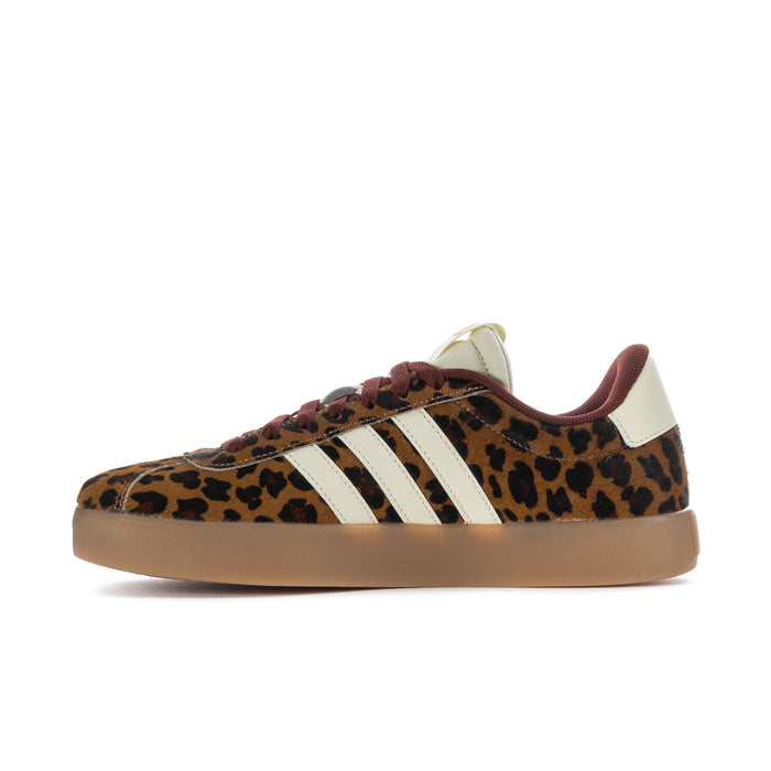 Leopard print low-top sneaker side view with cream stripes and burgundy laces